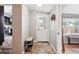 Inviting entryway with tiled floor and a front door with a window at 1331 Osceola St, Denver, CO 80204