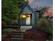 Charming home with an inviting front porch, beautiful landscaping, and a well-maintained exterior at 1331 Osceola St, Denver, CO 80204