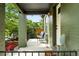 Cozy covered front porch with outdoor seating and well-maintained architecture, creating a welcoming entrance at 1331 Osceola St, Denver, CO 80204