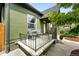 Inviting front porch with outdoor seating, enhancing the curb appeal of the house at 1331 Osceola St, Denver, CO 80204