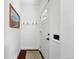 Inviting hallway with a decorative front door, providing a warm and stylish entrance at 1331 Osceola St, Denver, CO 80204