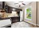 Efficient kitchen with stainless steel appliances, dark cabinetry, and ample counter space for meal preparation at 1331 Osceola St, Denver, CO 80204