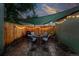 Cozy patio with a shade, string lights, and outdoor furniture at 1331 Osceola St, Denver, CO 80204