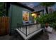 Inviting front porch with railing and seating area at 1331 Osceola St, Denver, CO 80204