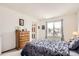 Bedroom with a large window, and neutral carpet at 6366 Nassau Ct, Highlands Ranch, CO 80130