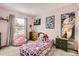 Bedroom featuring a window and neutral carpet at 6366 Nassau Ct, Highlands Ranch, CO 80130