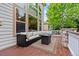 Relaxing back deck with comfortable outdoor seating and views of the backyard at 6427 S Tibet St, Aurora, CO 80016