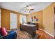 Inviting home office boasts a ceiling fan, natural light and neutral paint palette at 6427 S Tibet St, Aurora, CO 80016