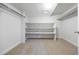 Well-organized walk-in closet with built-in shelving and ample storage space at 6427 S Tibet St, Aurora, CO 80016