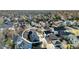 Charming blue single-Gathering home features solar panels, a driveway, a spacious yard, and mature trees at 920 Neon Forest Cir, Longmont, CO 80504