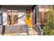 Charming home entrance with a bright yellow door, decorative wreath, and inviting curb appeal at 920 Neon Forest Cir, Longmont, CO 80504