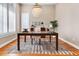 Elegant office space with a sophisticated chandelier, spacious desk, and tranquil ambiance at 920 Neon Forest Cir, Longmont, CO 80504