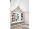 Cozy reading nook with built-in bookshelves and a window seat in a well-lit space at 920 Neon Forest Cir, Longmont, CO 80504
