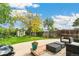 Cozy backyard patio with comfortable seating and charming string lights, perfect for entertaining at 3625 W 9Th Ave, Denver, CO 80204
