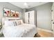 Inviting bedroom with closet, bright colors, artwork, soft lighting, creating a peaceful personal retreat at 3625 W 9Th Ave, Denver, CO 80204