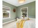 Cozy bedroom with natural light, a full bed, warm tones, and a peaceful ambiance for restful nights at 3625 W 9Th Ave, Denver, CO 80204
