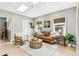 Bright living room with a skylight, cozy seating, and modern design elements at 3625 W 9Th Ave, Denver, CO 80204