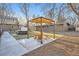 Backyard patio with pergola, Adirondack chairs and a hot tub at 4385 Carr St, Wheat Ridge, CO 80033