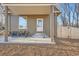 Inviting front porch with seating area and stylish front door at 4385 Carr St, Wheat Ridge, CO 80033