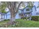 Well-maintained two-story home features mature trees, lush green lawn, and a classic suburban appeal at 5455 W 112Th Pl, Westminster, CO 80020