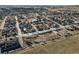 Aerial view shows new development site and nearby Main Street with existing homes and future parking lot location at 653 S Main St, Elizabeth, CO 80107