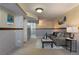 Open basement featuring textured walls, neutral carpet, and a lounge area at 653 S Main St, Elizabeth, CO 80107