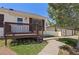 Charming front porch with walkway and well maintained lawn at 653 S Main St, Elizabeth, CO 80107