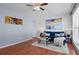 Inviting living room with stylish decor, a comfortable sofa, and ample natural light at 653 S Main St, Elizabeth, CO 80107