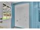 Functional mudroom with storage, access to backyard and laundry hookups at 1552 W Caley Ave, Littleton, CO 80120