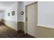 Clean hallway with neutral walls and carpeting at 14000 E Linvale Pl # 110, Aurora, CO 80014