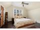 Cozy bedroom featuring a ceiling fan and natural light at 3337 Decatur St, Denver, CO 80211