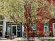 A building advertising Coffee, Breakfast, Egg Sandwiches, Salads, Paninis and Lunch at 3337 Decatur St, Denver, CO 80211