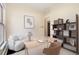 Comfortable home office with bright light, decor, and stylish bookshelf at 3337 Decatur St, Denver, CO 80211