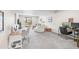 Spacious basement featuring carpet, multiple desks and lots of natural light at 7678 S Old Hammer Way, Aurora, CO 80016