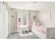 bedroom featuring a twin bed and built-in storage at 7678 S Old Hammer Way, Aurora, CO 80016