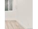 Well lit bedroom with neutral carpet and a large window at 277 S Jackson St, Denver, CO 80209