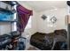 Bright bedroom with a cozy feel, featuring neutral walls, natural light, and a comfortable bed at 358 S Osceola St, Denver, CO 80219