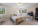 Cozy bedroom with work space and a view of the green surroundings at 120 Silver Leaf Way, Castle Rock, CO 80108