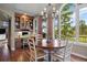 Dining room with hardwood floors, work station, and large windows providing ample light and scenic views at 120 Silver Leaf Way, Castle Rock, CO 80108