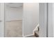 Unfinished basement with neutral carpet and stairs leading up to the first floor at 6523 S Field Way, Littleton, CO 80123