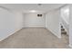 Spacious unfinished basement with neutral carpeting and a small window at 6523 S Field Way, Littleton, CO 80123