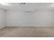 Spacious unfinished basement with carpet, recessed lighting, and potential for customization at 6523 S Field Way, Littleton, CO 80123