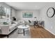 Inviting dining area with hardwood floors, neutral paint, and a modern table set at 6523 S Field Way, Littleton, CO 80123