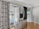 Spacious kitchen featuring a stainless steel refrigerator and adjacent sliding glass doors to the deck at 6523 S Field Way, Littleton, CO 80123