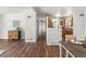 Long hallway connecting kitchen to dining room and other rooms at 5995 Estes St, Arvada, CO 80004