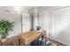 Study features closet, wood floors, and a desk overlooking the backyard at 5995 Estes St, Arvada, CO 80004