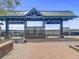 Well-maintained Olde Town Arvada train station with a covered waiting area and bike racks at 5995 Estes St, Arvada, CO 80004