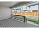 Covered back deck with views of the fenced yard, providing a relaxing outdoor space at 17163 Desert Wine Trl, Parker, CO 80134