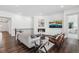 A warm and inviting living room space with wood floors and modern decor at 17163 Desert Wine Trl, Parker, CO 80134