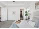 A bright main bedroom offers a tray ceiling and an ensuite bathroom at 17163 Desert Wine Trl, Parker, CO 80134